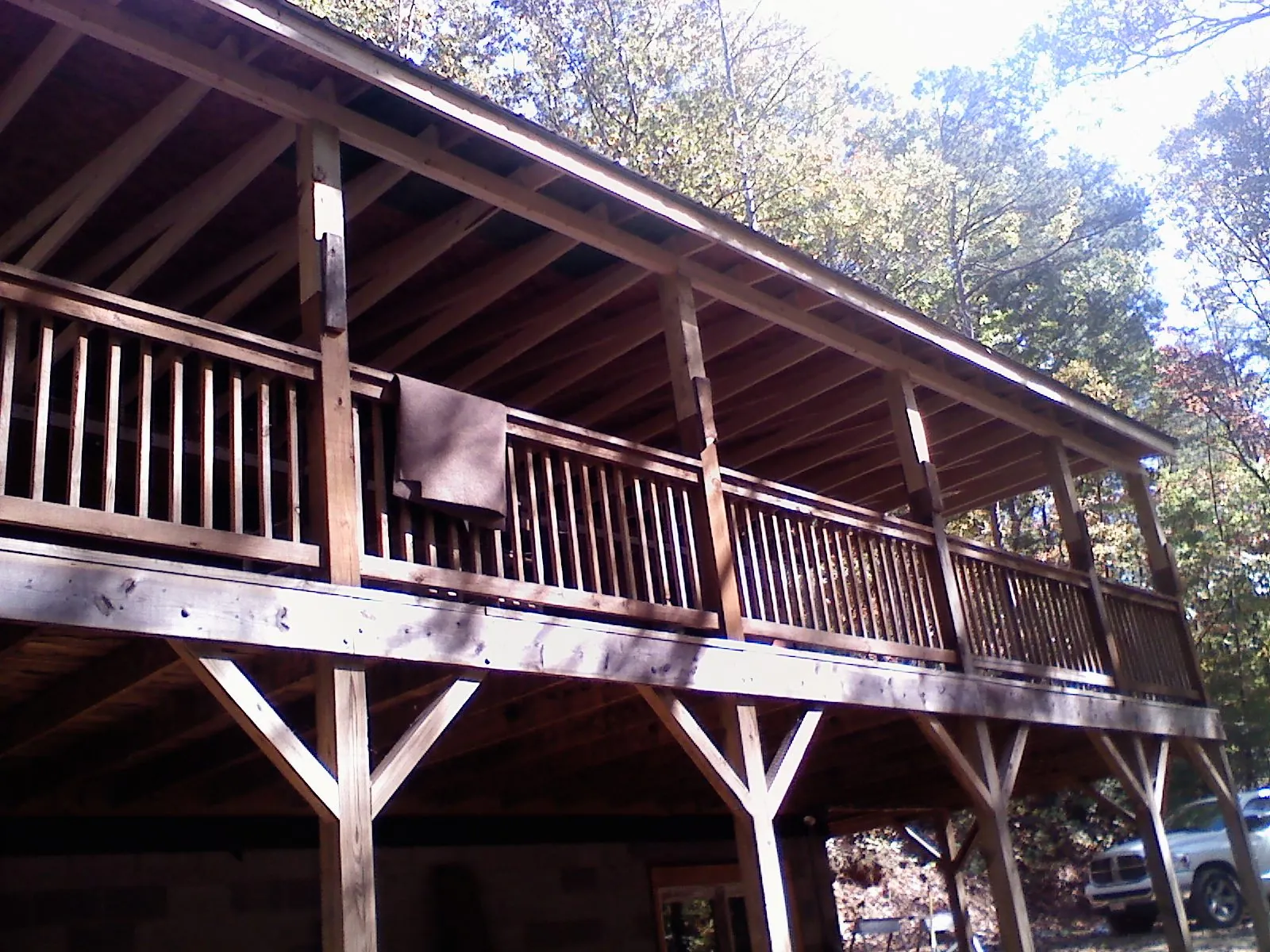 Timber framing under a new elevated porch and deck — Roof Leak Repair in Huntersville by Roofing Brothers
